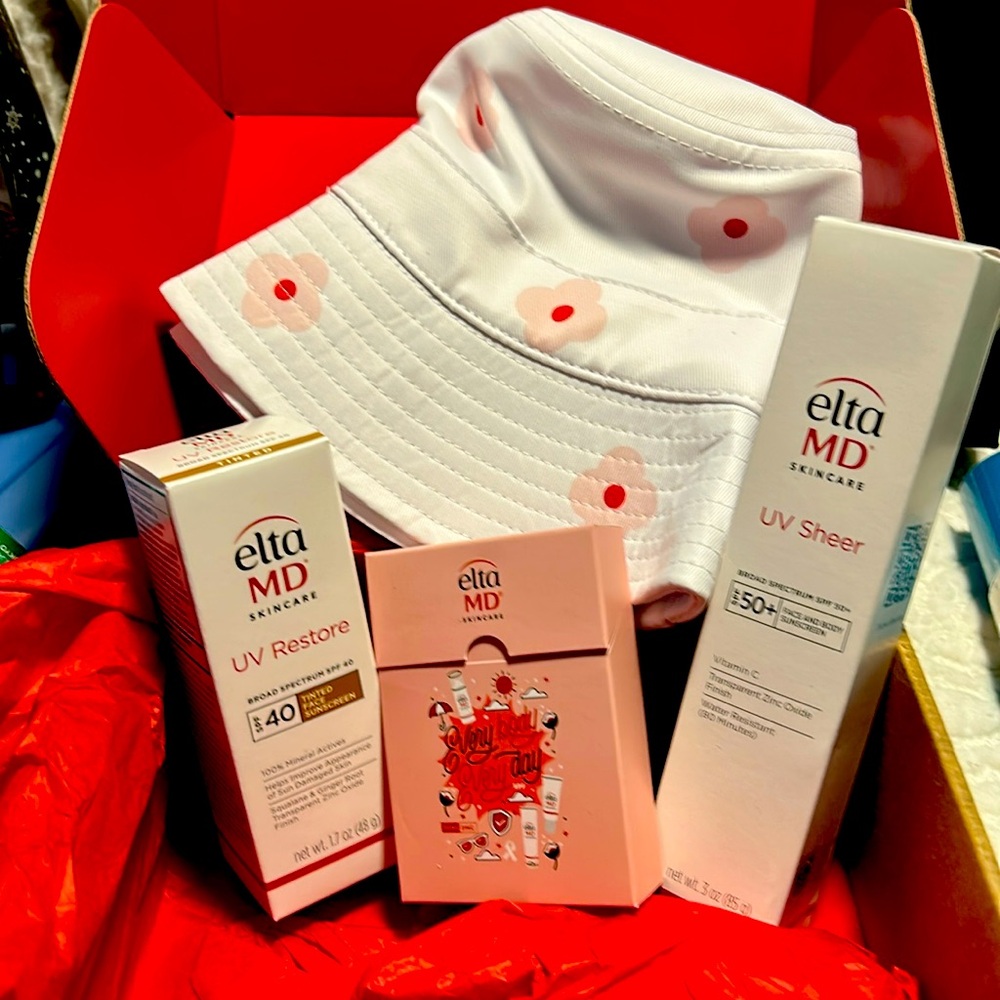 Elta Md up restore tint 1.7oz uv sheer50 3oz card and hat